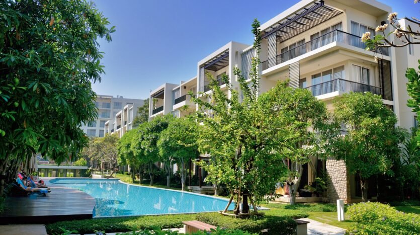 green trees near swimming pool during daytime